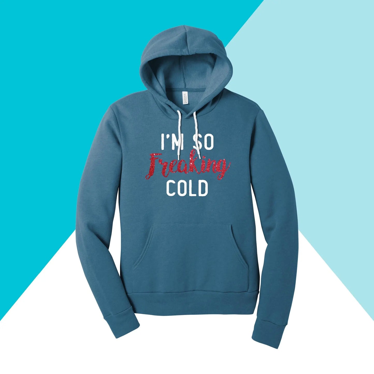 The Im So Freaking Cold Unisex Sparkle Glitter Hoodie Sweatshirt by North Owl Apparel features white and red text, white drawstrings, and is set against a diagonal background of teal, white, and light blue. Warm and cozy for winter.